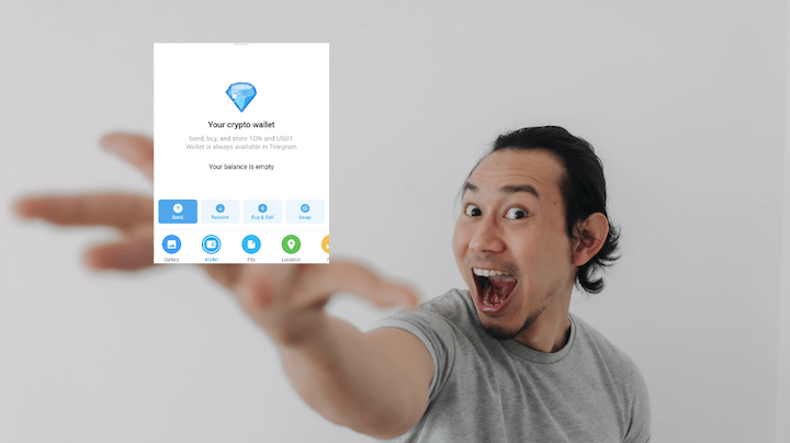 A person "holding" a screenshot with Telegram's wallet