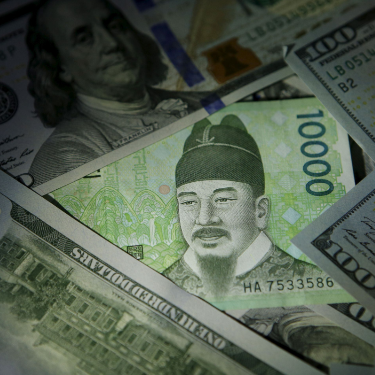 US dollar bills mixed with Korean won